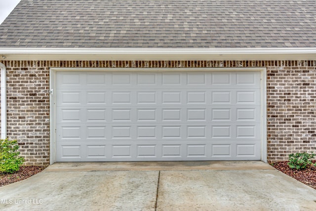 garage with driveway