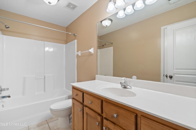 full bathroom featuring toilet, tile patterned flooring,  shower combination, and vanity