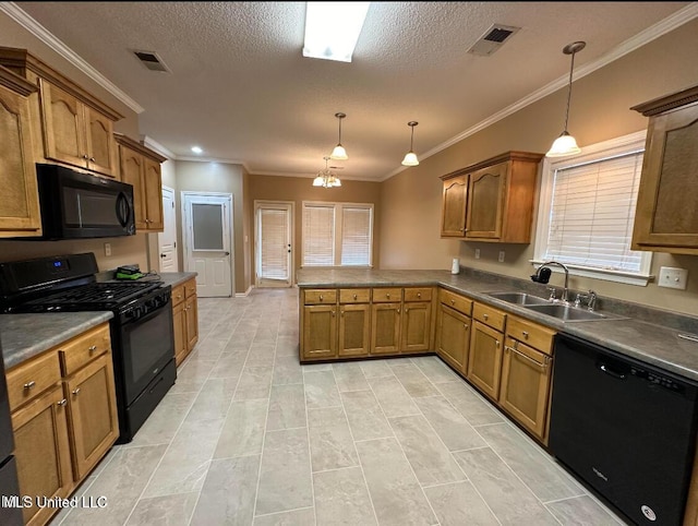 kitchen featuring kitchen peninsula, hanging light fixtures, a textured ceiling, black appliances, and sink