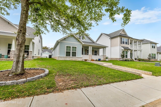 127 Grande View Dr, Biloxi, MS 39531 - view of front of home with covered porch and a front lawn