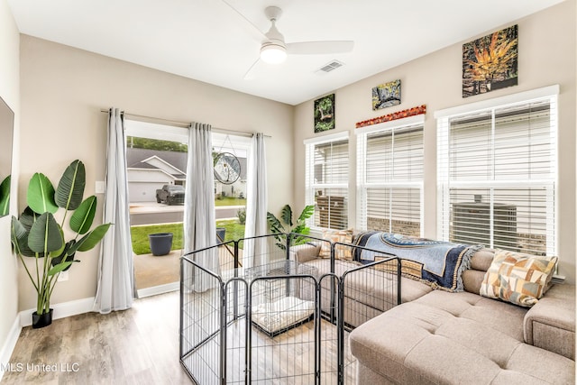127 Grande View Dr, Biloxi, MS 39531 - living area with baseboards, visible vents, wood finished floors, and ceiling fan
