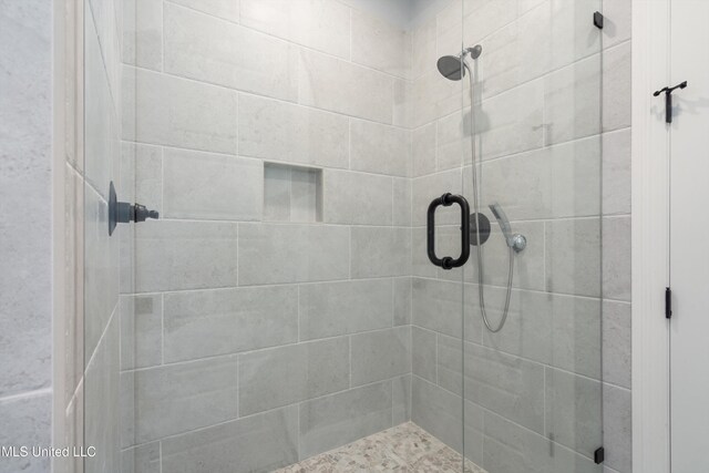 bathroom with an enclosed shower