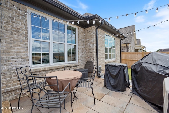 view of patio with a grill