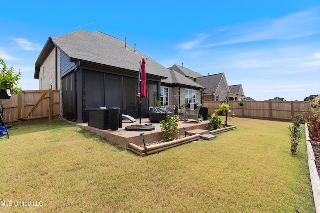 rear view of house featuring a lawn, central air condition unit, an outdoor living space, and a patio