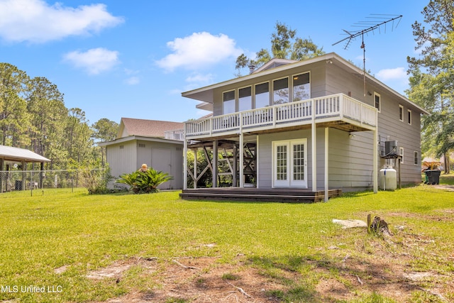 2529 Windward Dr, Gautier, MS 39553 - rear view of property with a deck, french doors, an outbuilding, and a cooling unit