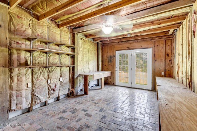 2529 Windward Dr, Gautier, MS 39553 - below grade area featuring a ceiling fan and brick flooring