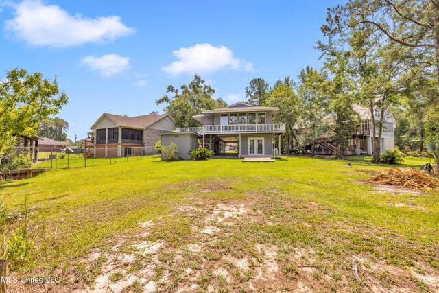 2529 Windward Dr, Gautier, MS 39553 - view of yard featuring french doors and a wooden deck