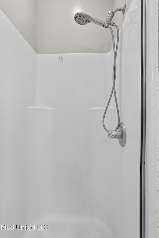 interior details with a shower