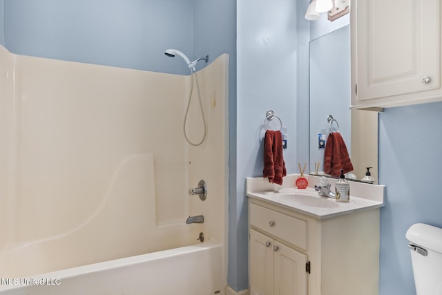 full bathroom with shower / bath combination, vanity, and toilet