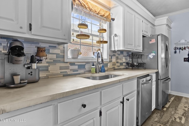 kitchen featuring white cabinetry, dishwasher, sink, and ornamental molding