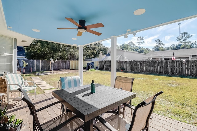 view of patio / terrace featuring ceiling fan