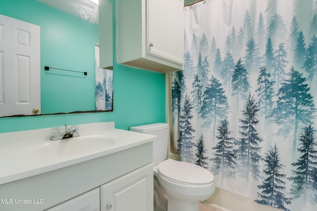 full bathroom featuring toilet, vanity, shower / tub combo with curtain, and a textured ceiling