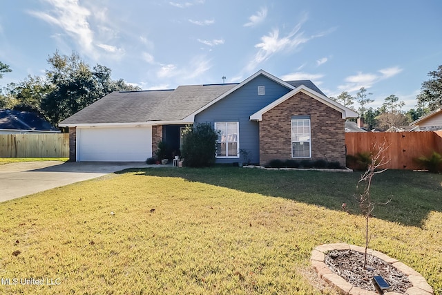 view of front facade with a garage and a front lawn