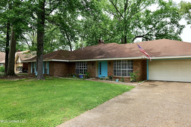 ranch-style home featuring an attached garage, brick siding, aphalt driveway, a front yard, and a chimney