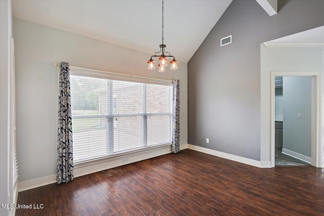 unfurnished dining area featuring dark wood-style floors, visible vents, baseboards, a chandelier, and high vaulted ceiling