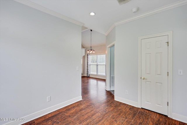 unfurnished room with dark wood-style flooring, a chandelier, baseboards, lofted ceiling, and ornamental molding