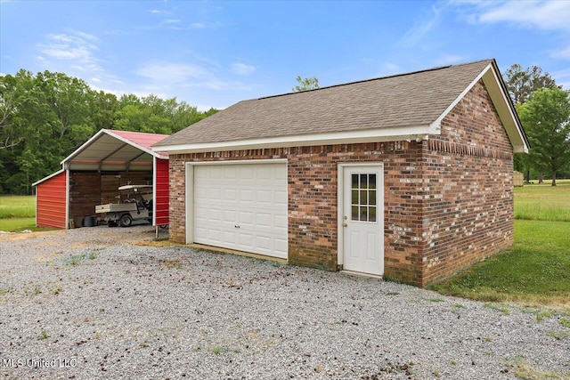 garage with a detached carport