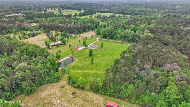 aerial view featuring a forest view