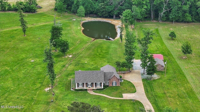 bird's eye view with a water view