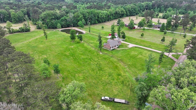 bird's eye view with a rural view and a view of trees