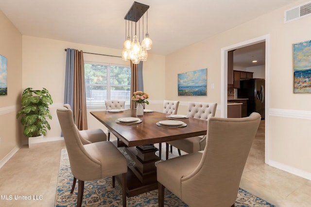 view of tiled dining room