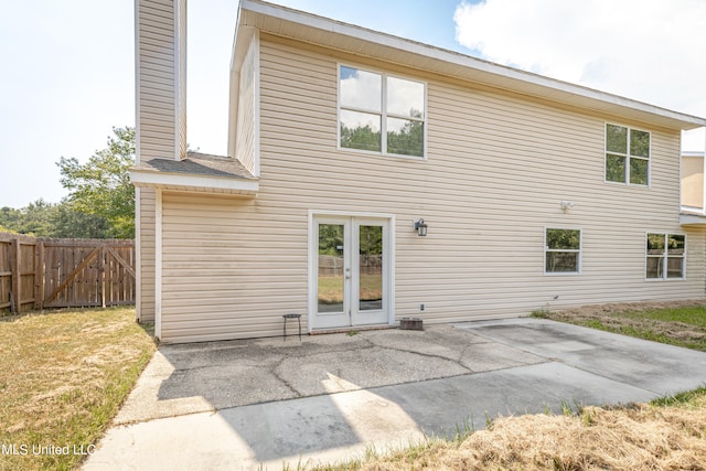 rear view of house featuring a patio