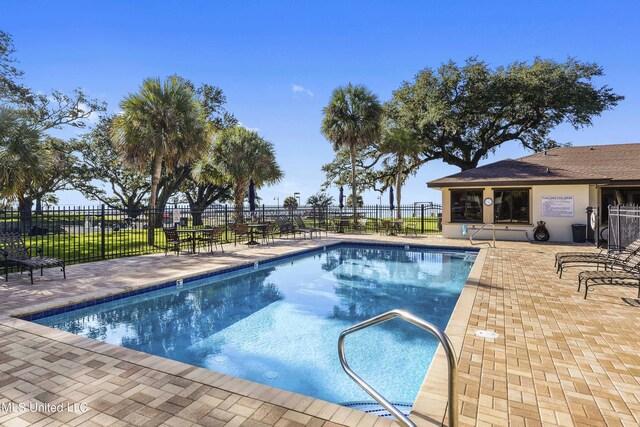 527 Front Beach Dr Unit 17, Ocean Springs, MS 39564 - community pool with a patio area