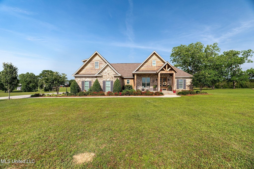 446 Newman Camp Rd, Sumrall, MS 39482 - craftsman-style house with a front lawn