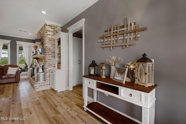 446 Newman Camp Rd, Sumrall, MS 39482 - hall with ornamental molding, light wood finished floors, and recessed lighting