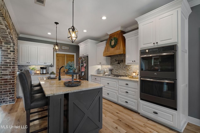 446 Newman Camp Rd, Sumrall, MS 39482 - kitchen featuring appliances with stainless steel finishes, a sink, tasteful backsplash, white cabinetry, and recessed lighting