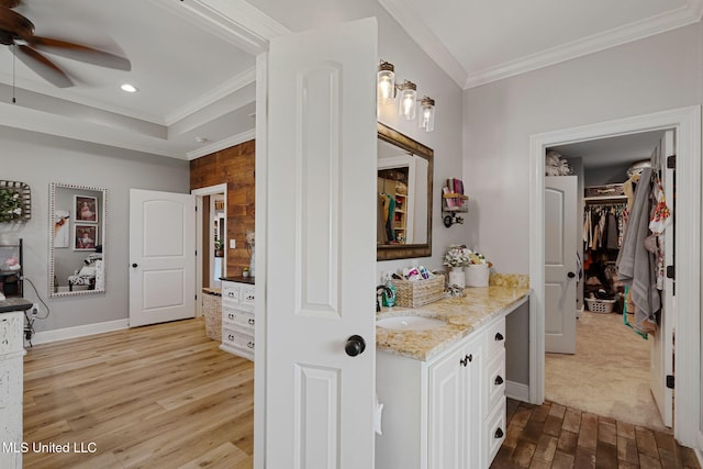 446 Newman Camp Rd, Sumrall, MS 39482 - full bath featuring crown molding, vanity, wood finished floors, ceiling fan, and a spacious closet