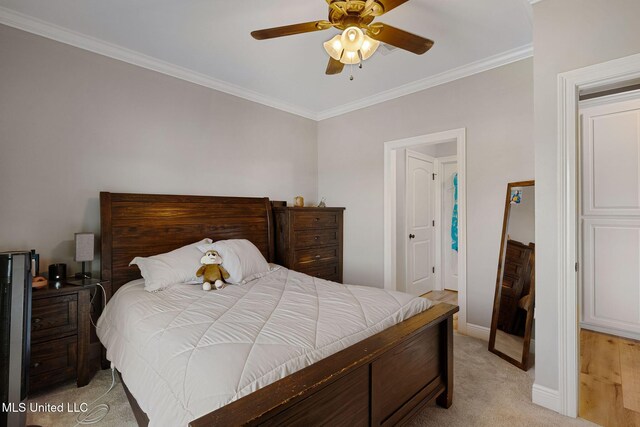 446 Newman Camp Rd, Sumrall, MS 39482 - bedroom featuring light colored carpet, ornamental molding, baseboards, and a ceiling fan