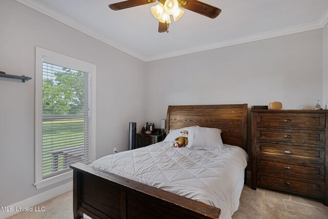 446 Newman Camp Rd, Sumrall, MS 39482 - bedroom with light carpet, ornamental molding, multiple windows, baseboards, and ceiling fan
