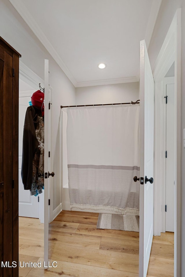 446 Newman Camp Rd, Sumrall, MS 39482 - full bathroom featuring wood finished floors, crown molding, curtained shower, and recessed lighting
