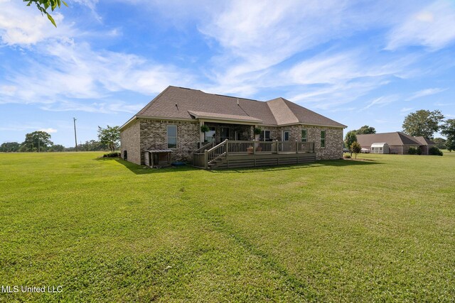 446 Newman Camp Rd, Sumrall, MS 39482 - rear view of house with a deck, a yard, brick siding, and cooling unit