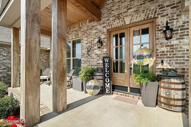 446 Newman Camp Rd, Sumrall, MS 39482 - doorway to property featuring french doors and brick siding