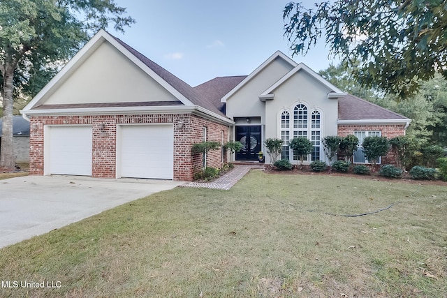 ranch-style house with a front lawn and a garage