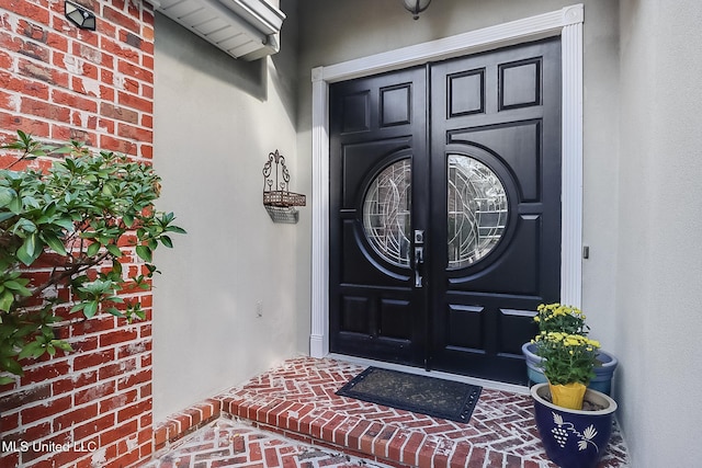 doorway to property with french doors