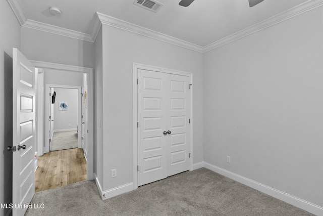 962 Glenwild Cir, Canton, MS 39046 - unfurnished bedroom with carpet, ornamental molding, baseboards, and ceiling fan