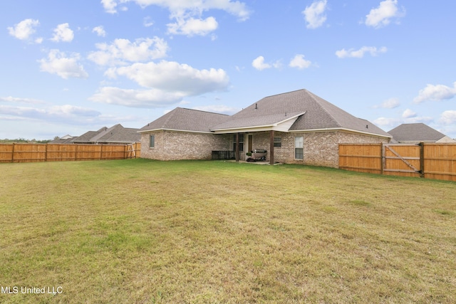 962 Glenwild Cir, Canton, MS 39046 - rear view of property featuring brick siding