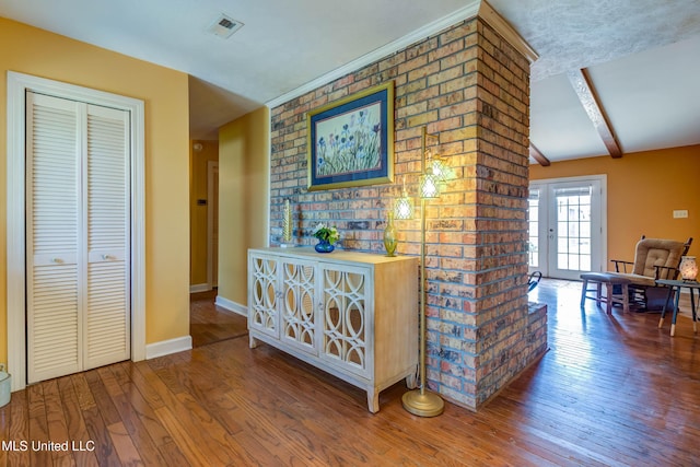 109 Boggs Cir, Long Beach, MS 39560 - hallway featuring wood-type flooring, beam ceiling, and french doors
