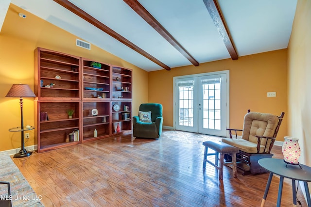 109 Boggs Cir, Long Beach, MS 39560 - living area with french doors and wood finished floors