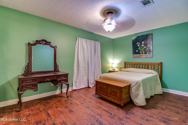 109 Boggs Cir, Long Beach, MS 39560 - bedroom featuring wood finished floors, a ceiling fan, and a textured ceiling