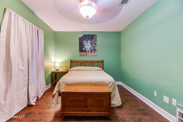 109 Boggs Cir, Long Beach, MS 39560 - bedroom with dark wood finished floors and ceiling fan