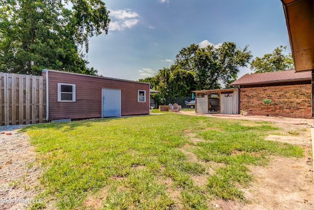 109 Boggs Cir, Long Beach, MS 39560 - fenced backyard with an outdoor structure