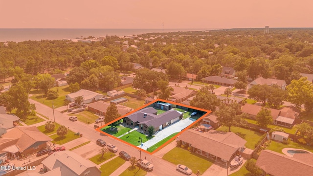 109 Boggs Cir, Long Beach, MS 39560 - aerial view at dusk of property boundaries highlighted and a residential view