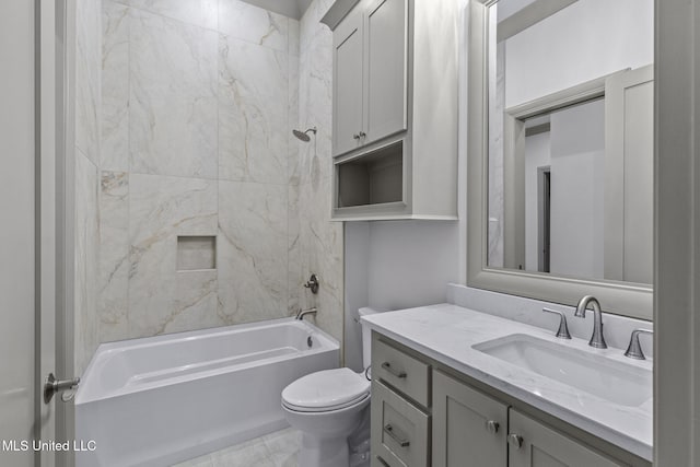 bathroom with toilet, shower / washtub combination, and vanity