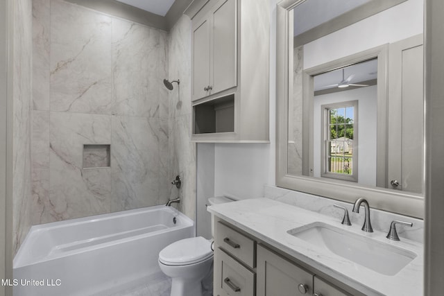 full bath featuring bathtub / shower combination, vanity, and toilet
