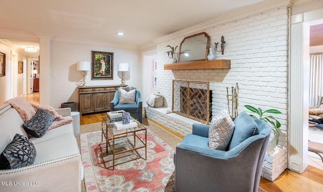 102 Melrose Montebello Pkwy, Natchez, MS 39120 - living area featuring ornamental molding, light wood-style floors, a brick fireplace, and recessed lighting