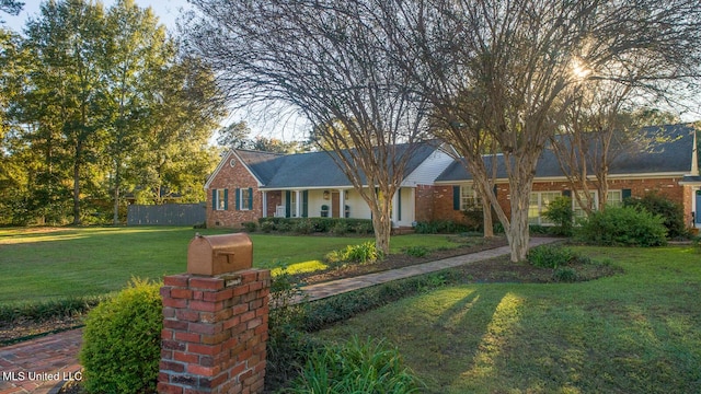 view of front of property with a front lawn